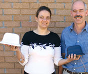 Margherita Perini (left), Webb inventor and Terry Reuss, Webb engineer, show off two of the unique antennas developed specifically for Transnet Freight Rail